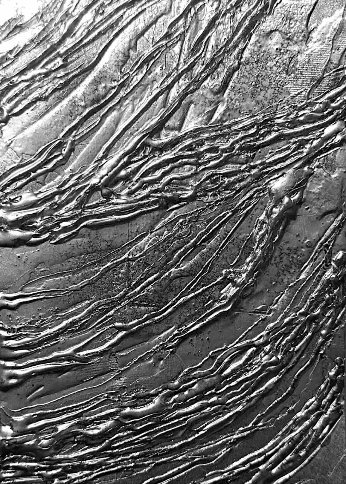 silver spraypainted bookcover with textures and prints